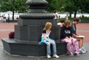 Mackensie, Josie and Mom Under a Flagpole