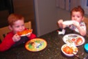 Jackson and Hayden Eating Their Pizzas